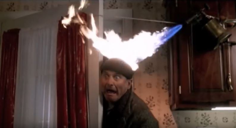 marv's head on fire with a blowtorch in home alone