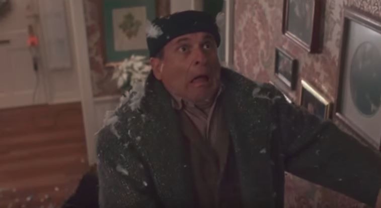 a paint can flies toward harry's face in home alone