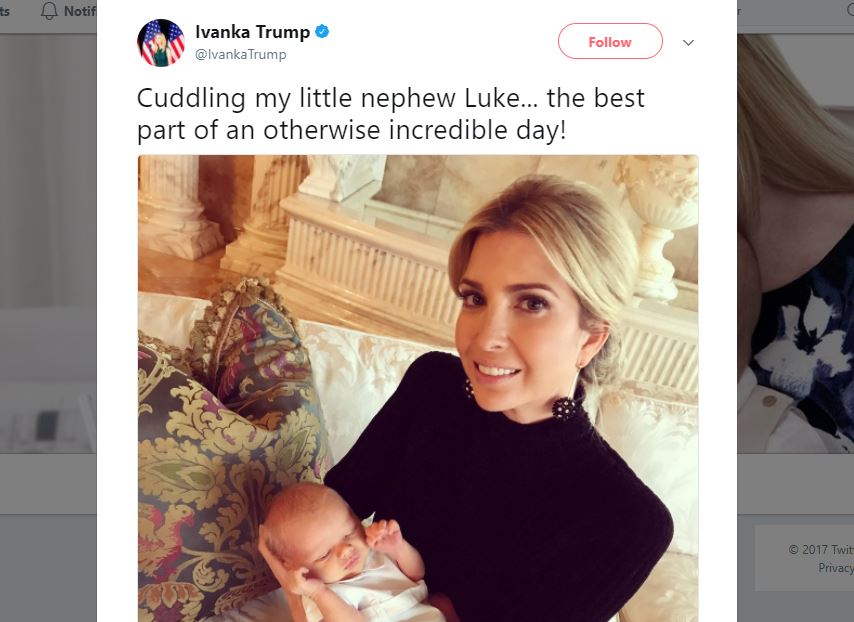 A tweet from Ivanka Trump with a photo of her holding a baby