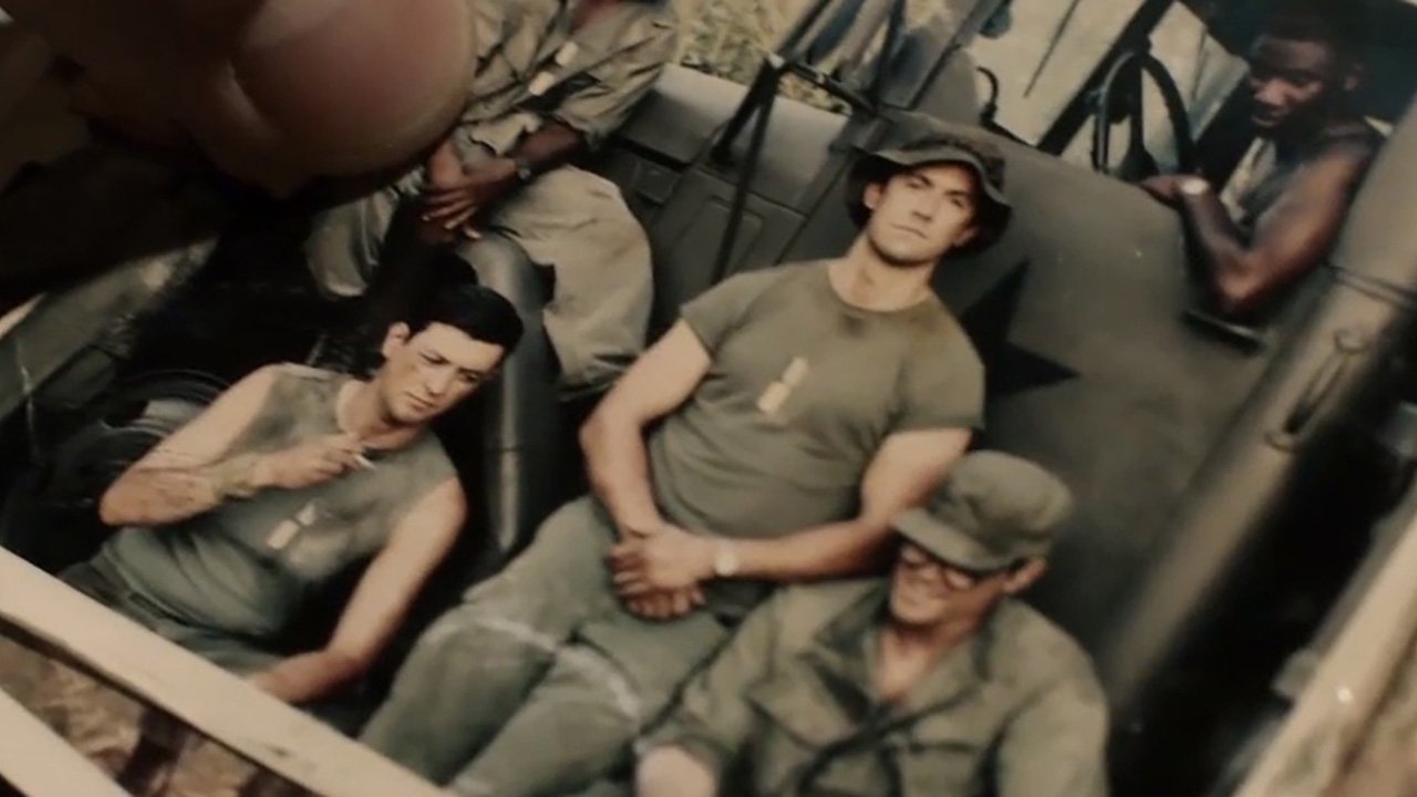 Jack Pearson (Milo Ventimiglia) holds a photo of himself and his brother Nick in Vietnam in a scene from 'This Is Us.'
