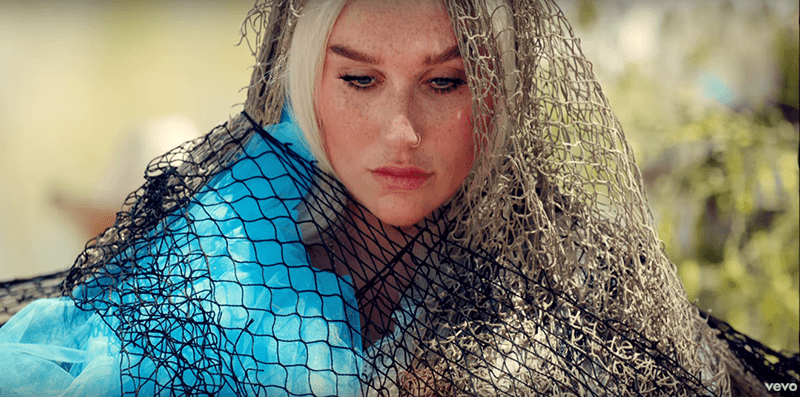 Kesha wearing a net in the "Praying" music video Kesha wearing a net in the "Praying" music video