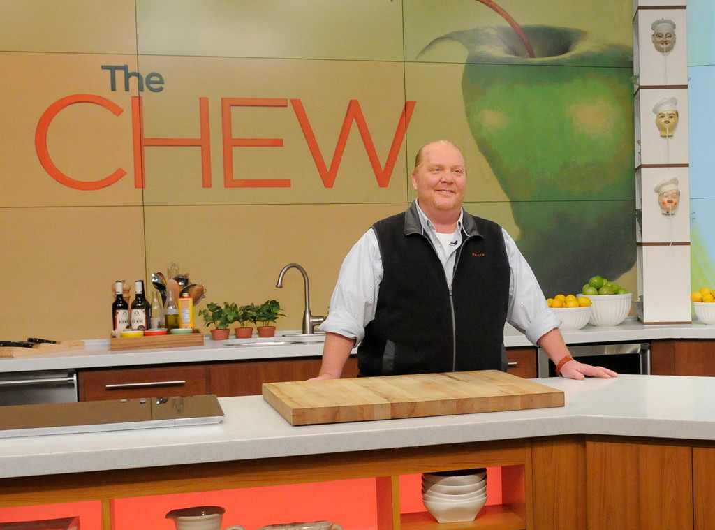 Mario Batali on The Chew standing in a kitchen