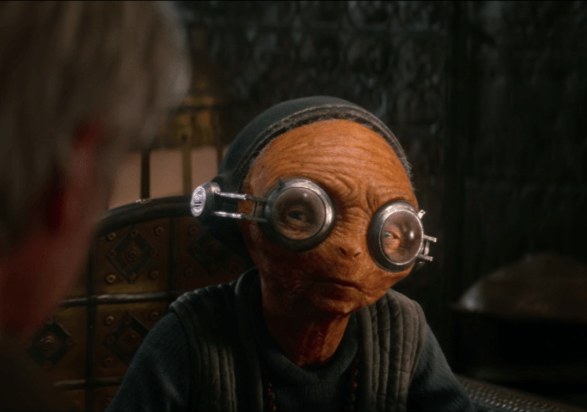 Maz Kanata asks Han Solo a question in Star Wars: The Force Awakens