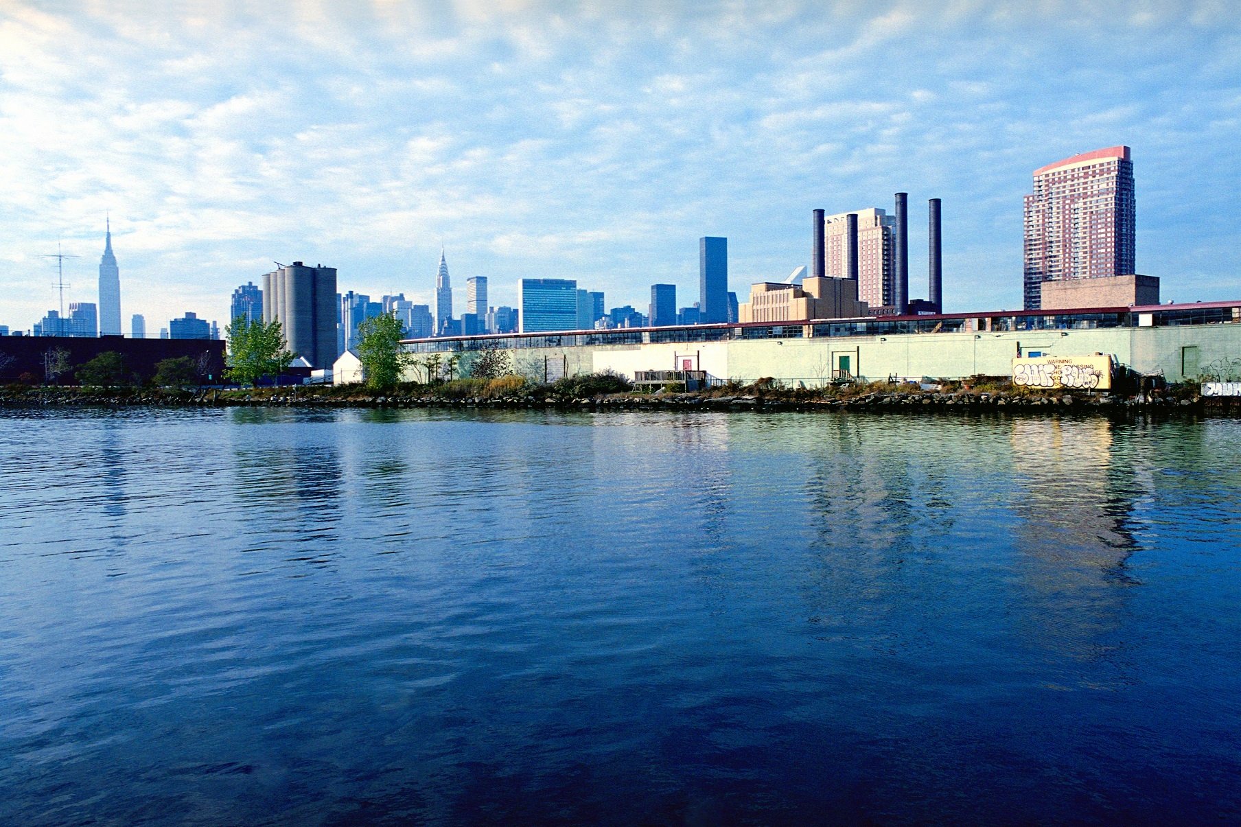 New York skyline warehouses buildings reflected in the water