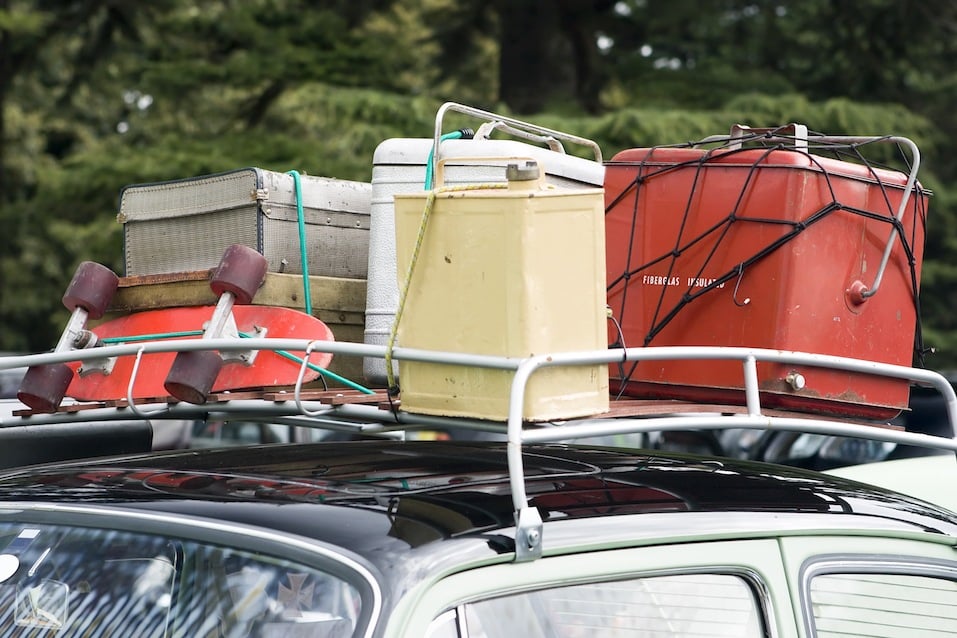 retro vacation Car roof rack showing holiday items.