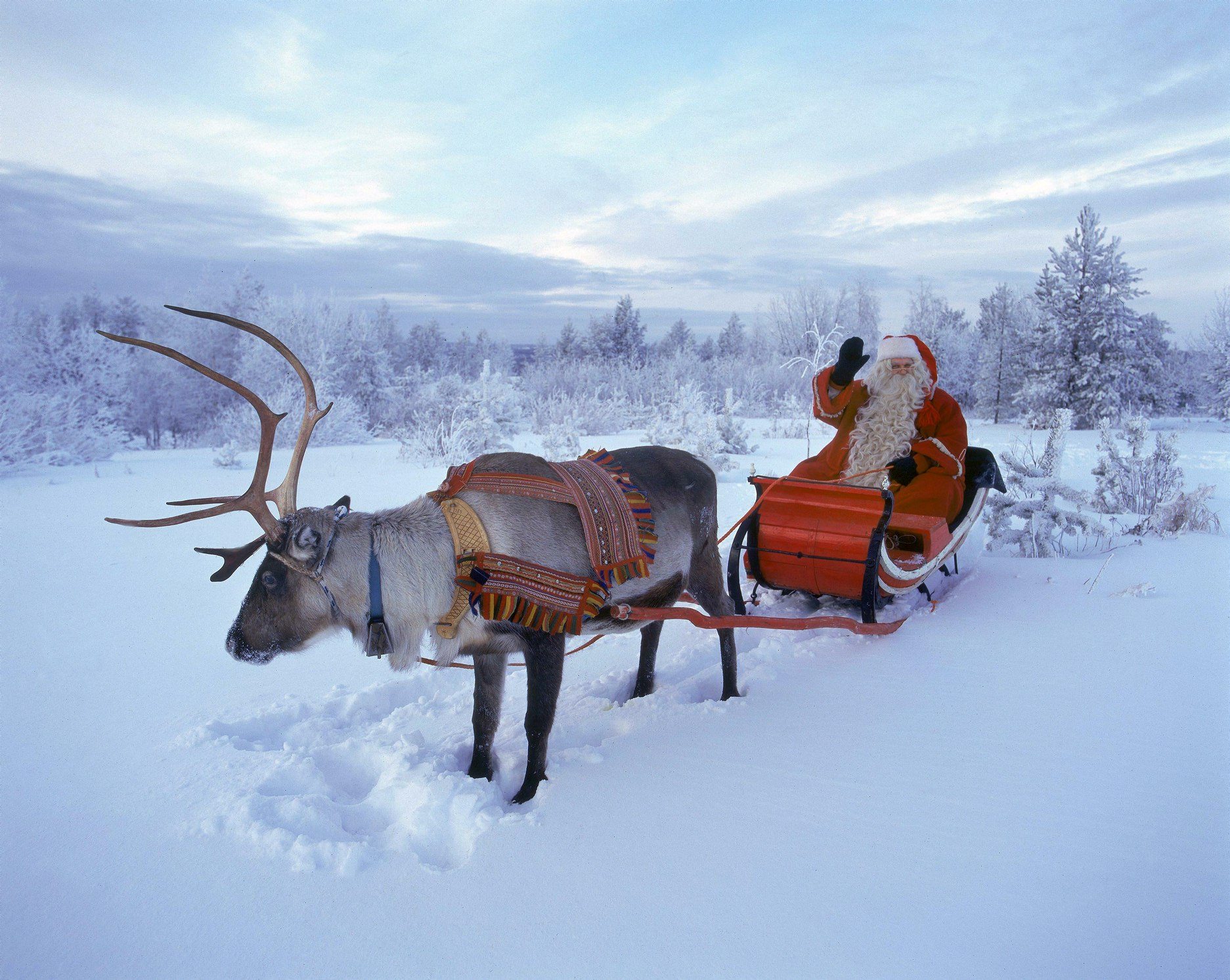 Santa Claus waves in Rovaniemi, Finnish