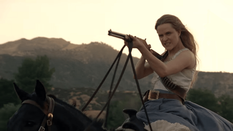 Dolores rides a horse and aims a gun in the Westworld Season 2 trailer