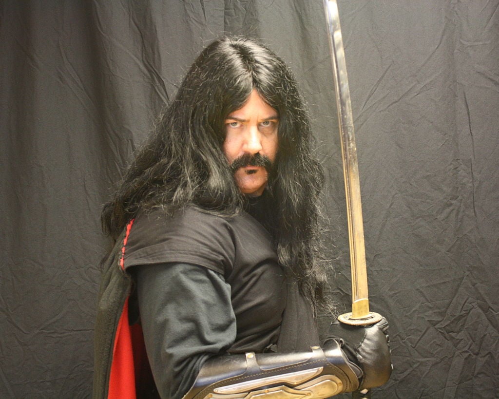Jonathon Sharkey with a sword