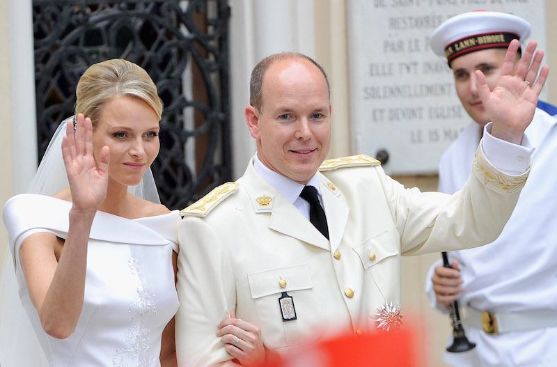 The royal couple waves at their guests not heir wedding day as they make an appearance together. The royal couple waves at their guests not heir wedding day as they make an appearance together.