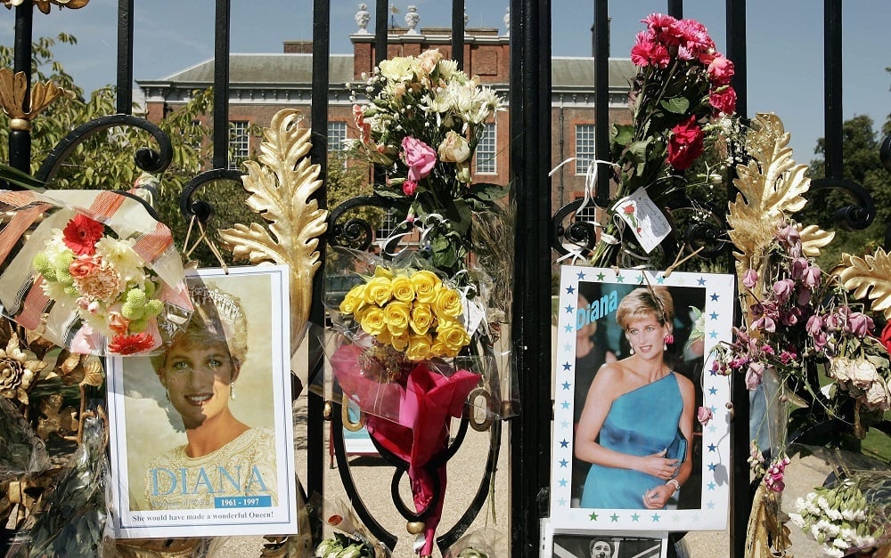 Flowers, photographs and tributes are placed in memory of Princess Diana