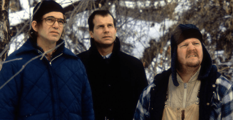 Three men standing in the snow. Three men standing in the snow.