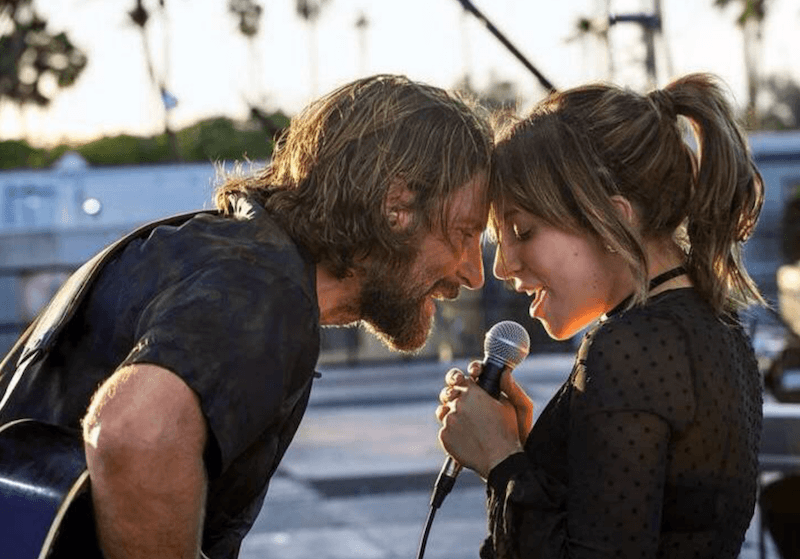 Two characters performing on stage. Two characters performing on stage.
