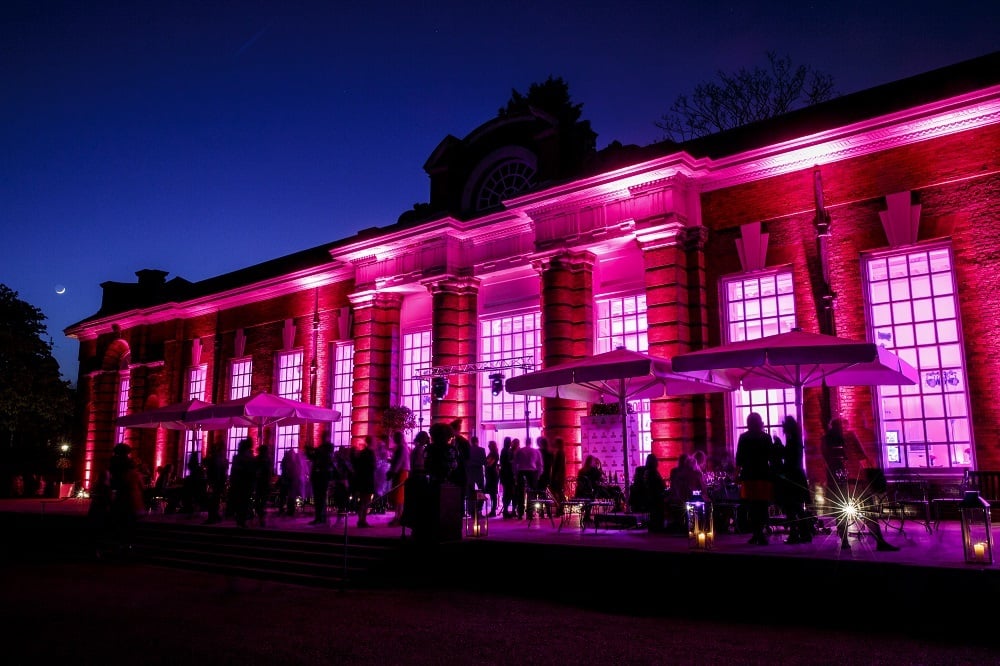 Kensington Palace is turned pink with lights at the Cosmopolitan The Orangery at Kensington Palace