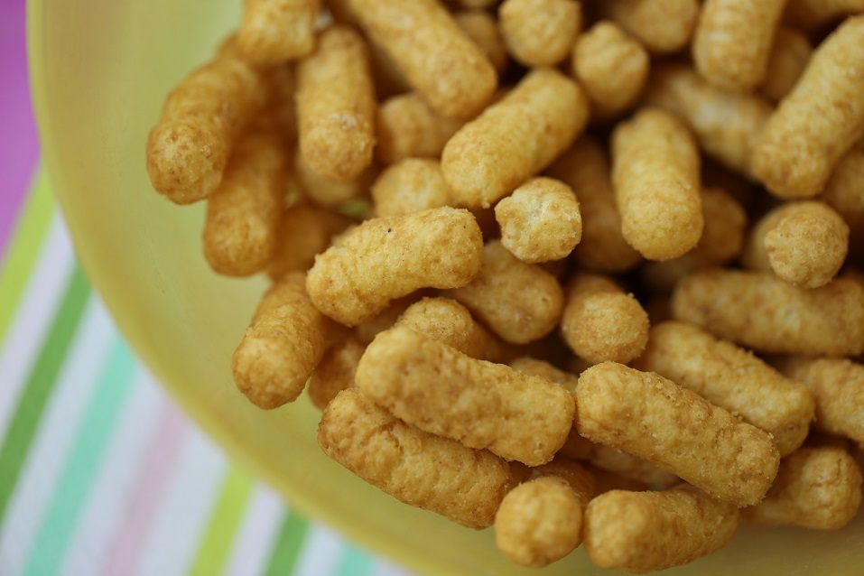 Stack of natural salty snack made of peanuts for toddlers