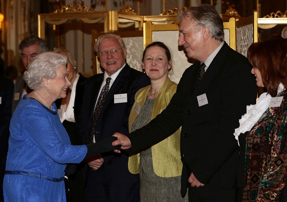 Queen Elizabeth II meets British actor Alan Rickman Britain's Queen Elizabeth II (L) meets British actor Alan Rickman (2nd R) during a Reception for the Dramatic Arts