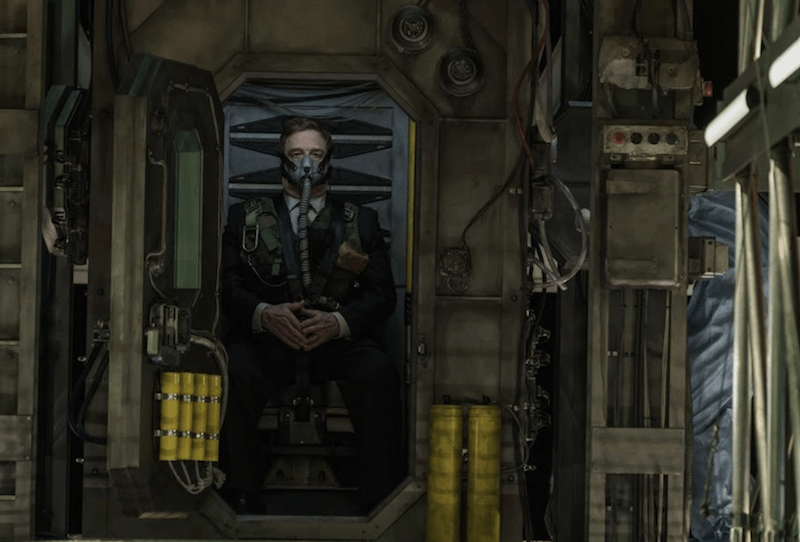 John Goodman wearing a face mask and tube in 'Captive State'. John Goodman wearing a face mask and tube in 'Captive State'.