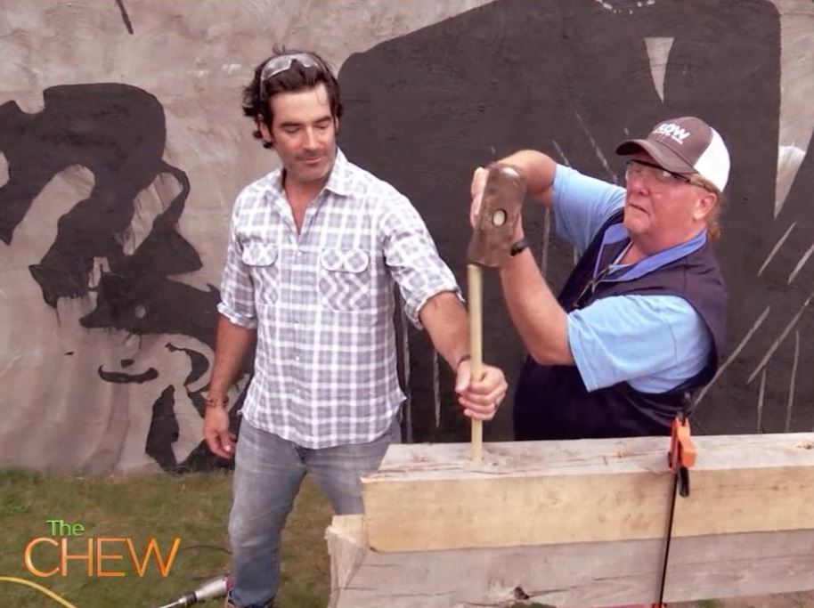 Carter Oosterhouse and chef Mario Batali work on a house project