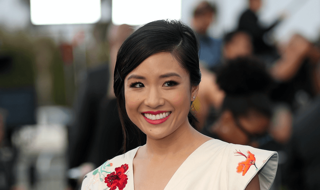 Constance Wu smiling on a red carpet. Constance Wu smiling on a red carpet.
