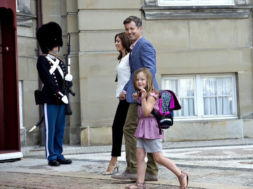 Danish Princess Isabella waves as she leaves with her parents Crown Prince Frederik and Crown Princess Mary at Amalienborg Palace in Copenhagen.