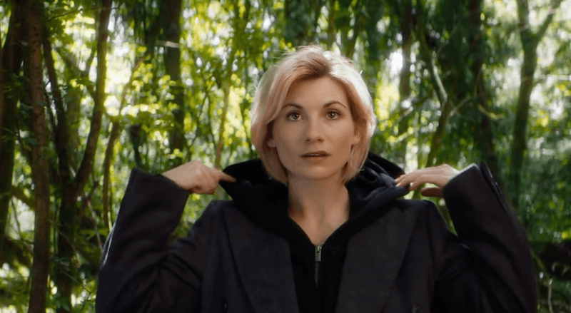 The Doctor stands in a forest wearing black. The Doctor stands in a forest wearing black.
