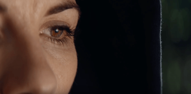 A woman's brown eye seen in a close-up. A woman's brown eye seen in a close-up.