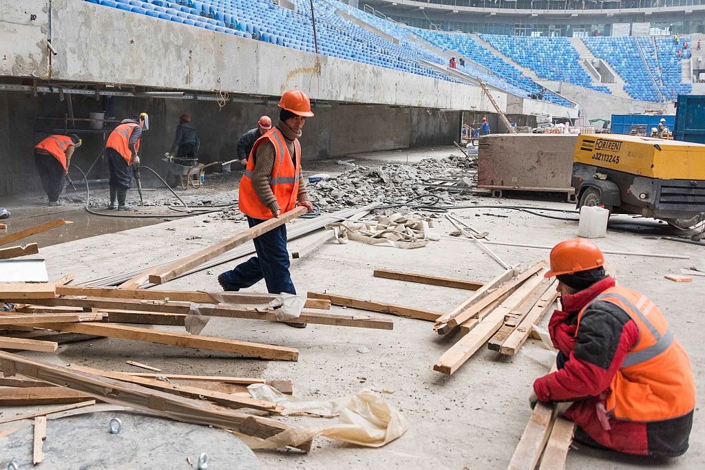 Workers at the Saint-Petersburg Stadium during construction works