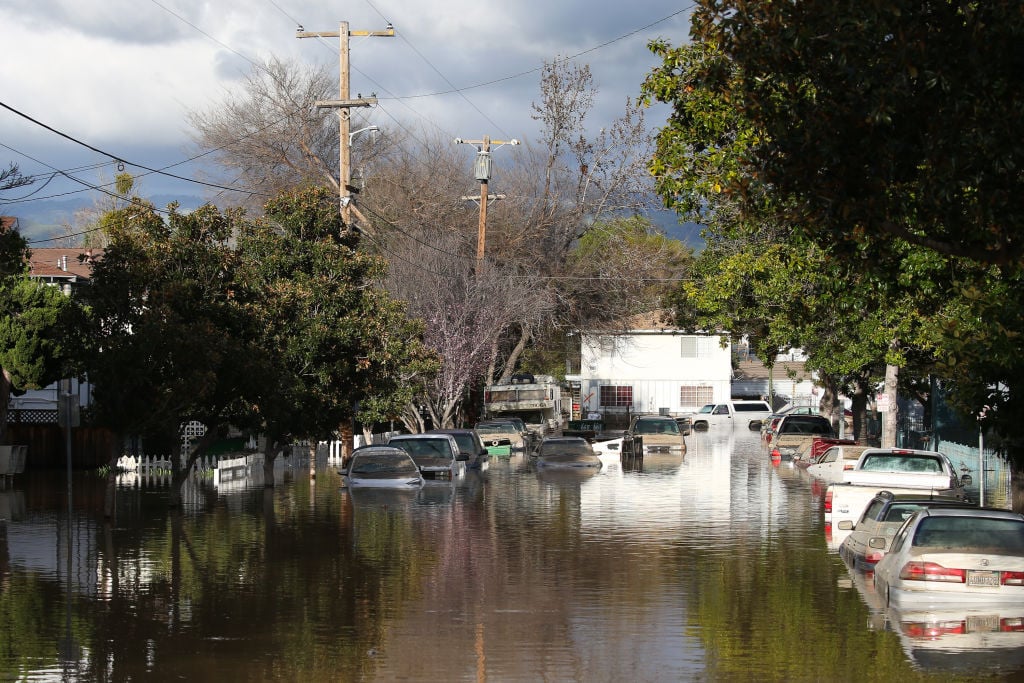 Cars are seen in floodwaters in San Jose, California