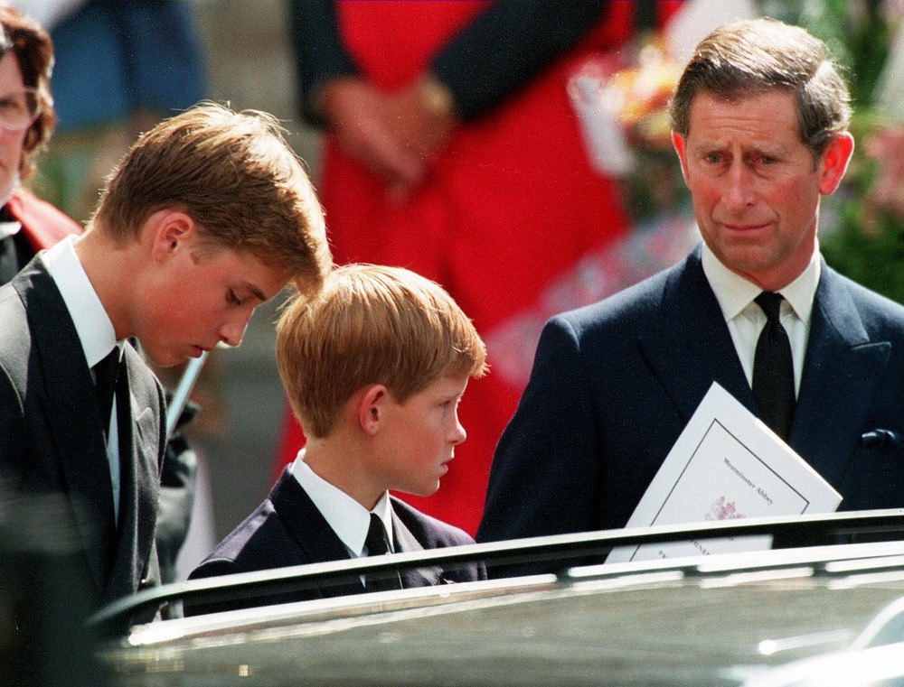 Former husband of Diana Prince Charles (L) and their two sons Harry (C) and William