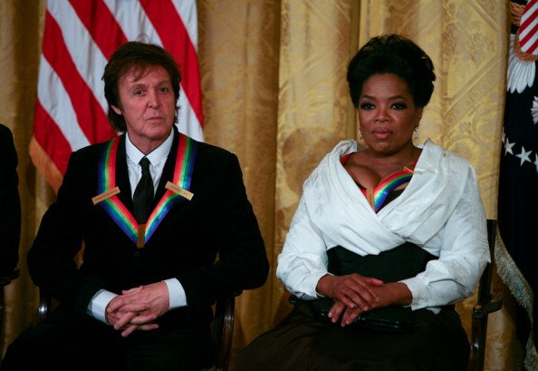 Oprah and Paul McCartney listen to Obama as he gives a speech during the 2010 Kennedy Center Honorees oprah and paul mccartney