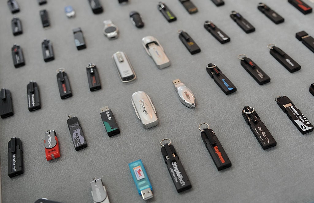rows of USB flash drives rows of USB flash drives