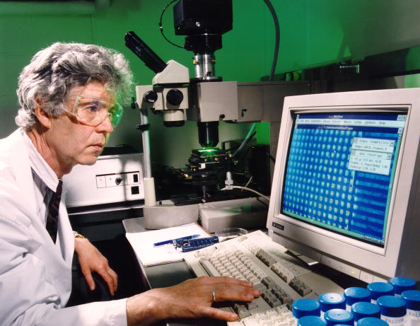 Scientist Viktor Barski of the Russian Engelhardt Institute of Molecular Biology studies the computer data from an Argonne-developed microchip used to speed sequencing of the human genome