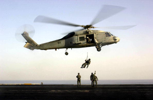 US Navy SEALs train with an SH-60F "Seahawk" helicopter on the flight d US Navy SEALs train with an SH-60F "Seahawk" helicopter on the flight d