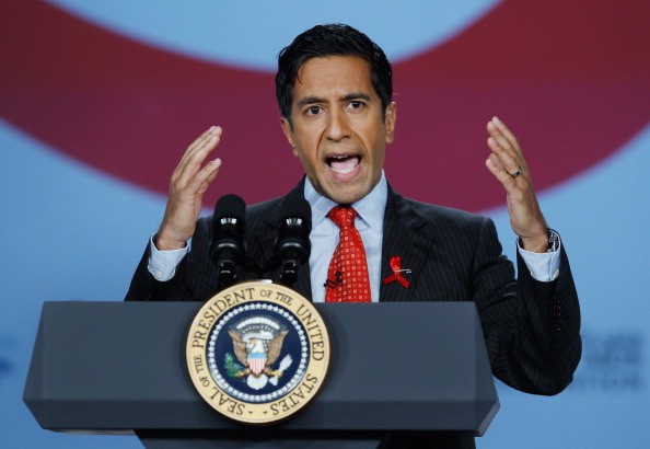 Dr. Sanjay Gupta hosts an event on a World AIDS Day event at the Jack Morton Auditorium on the campus of George Washington University December 1, 2011 in Washington, DC. Focusing on "the beginning of the end of AIDS," the event was sponsored by HIV/AIDS awareness organizations The ONE Campaign and (RED). Speakers also included former Presidents George W. Bush and Bill Clinton (via satellite link), Sen. Marco Rubio (R-FL), Rep. Barbara Lee (R-CA), Tanzanian President Jakaya Mrisho Kikwete (via satellite from Tanzania), and music artists Bono and Alicia Keys. dr. sanjay gupta speaks behind a podium