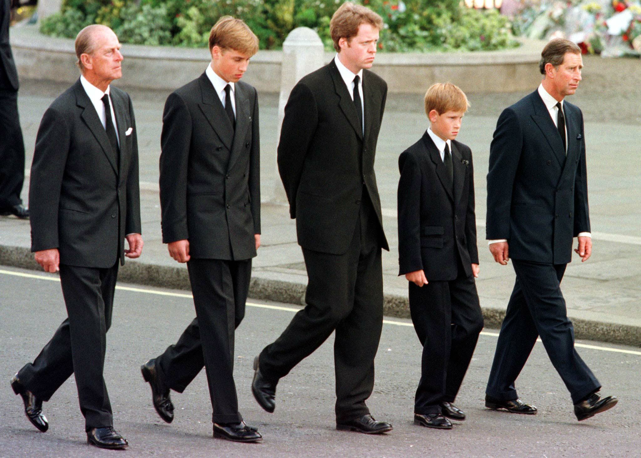 (L to R) The Duke of Edinburgh, Prince William, Earl Spencer, Prince Harry and Prince Charles walk outside Westminster Abbey during the funeral service for Diana, Princess of Wales.