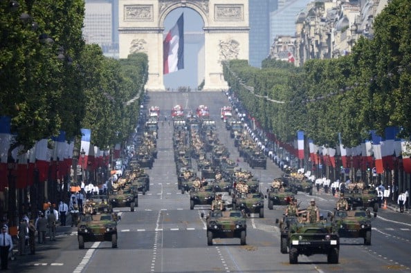 Members of the mechanised infantry march during the Bastille Day parade on the Champs Elysees avenue.