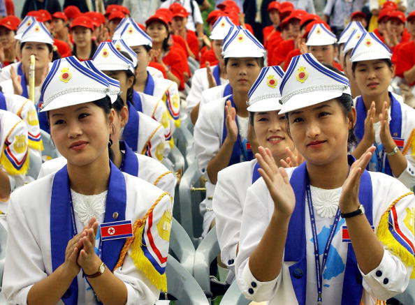 North Korean cheering squad applause during the welcoming ceremony in Daegu