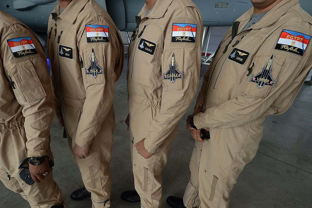Egypt air force specially trained Rafale fighter jets pilots pose at an air base.