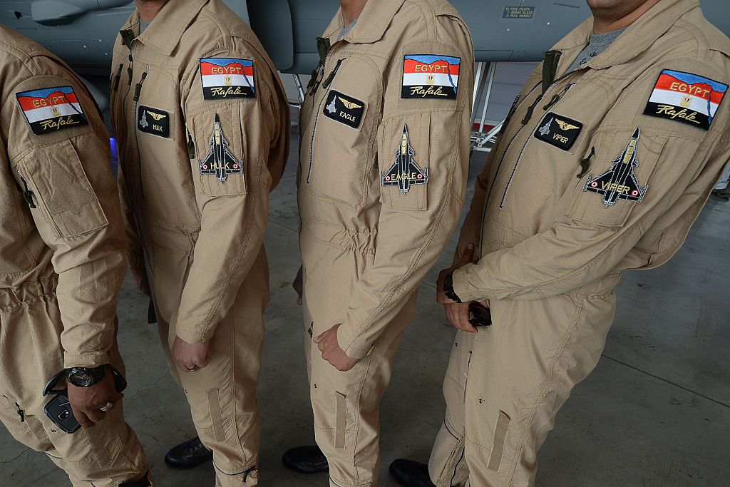 Egypt air force specially trained Rafale fighter jets pilots pose at an air base. Egypt air force specially trained Rafale fighter jets pilots pose at an air base.