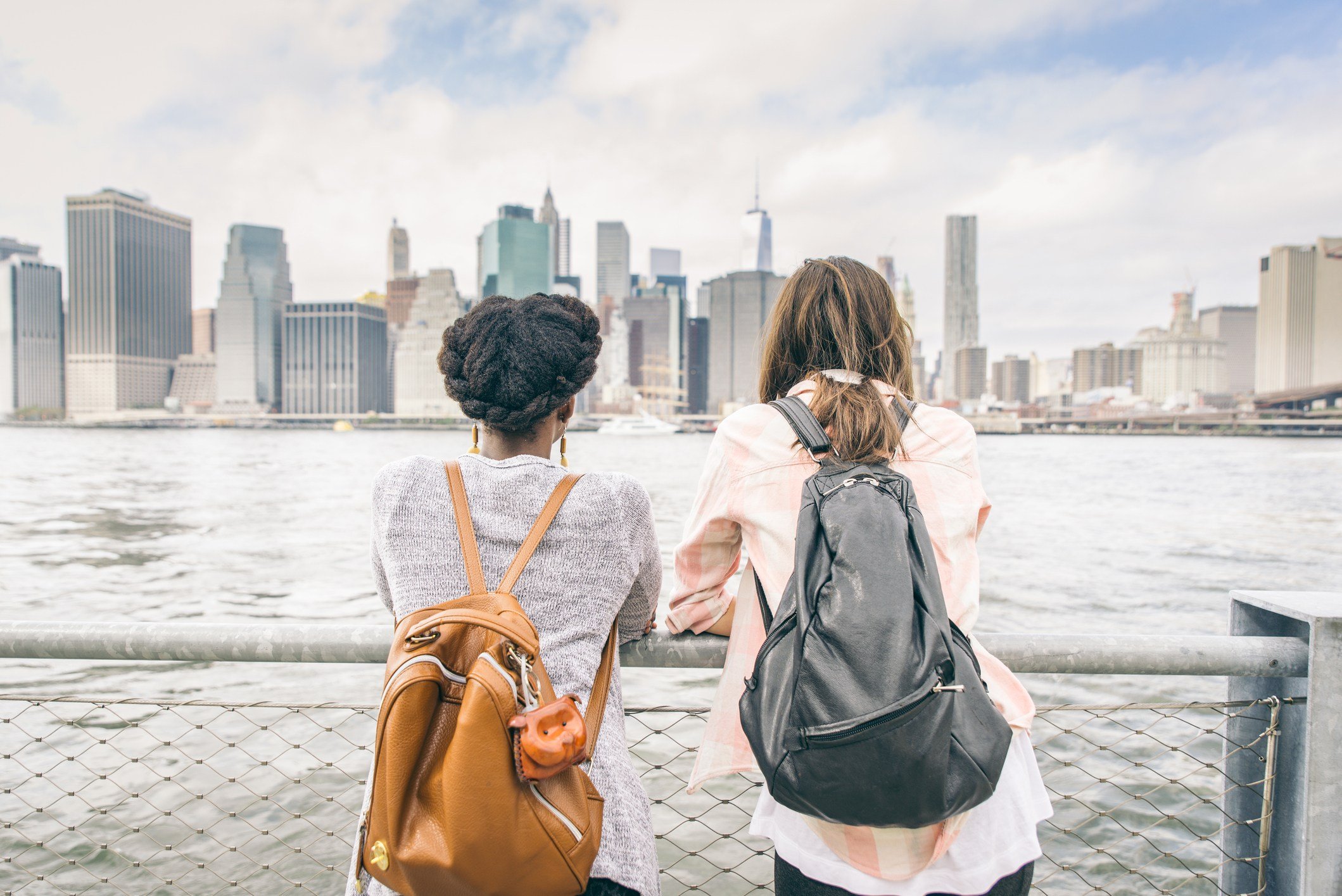 Two women looking at New York's skyline