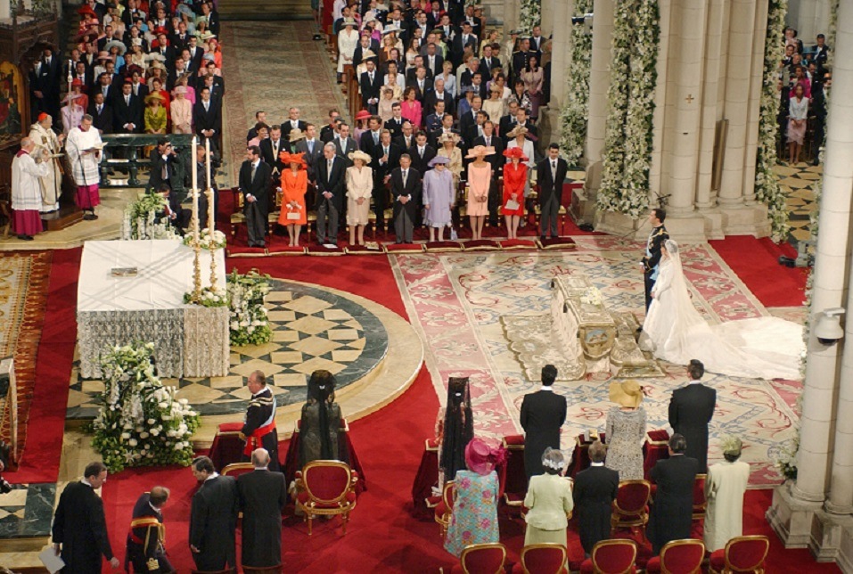 Spain's Crown Prince Felipe de Bourbon stands next to his bride Letizia Ortiz as they marry in Almudena cathedral