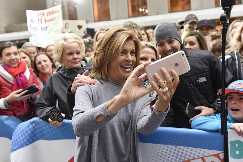 Hoda Kotb poses for a selfie with fans
