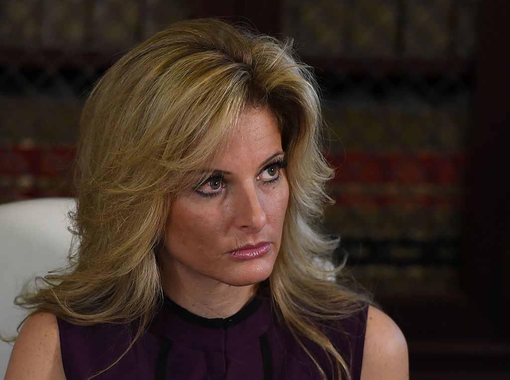 Summer Zervos sitting in a chair at a court. Summer Zervos sitting in a chair at a court.