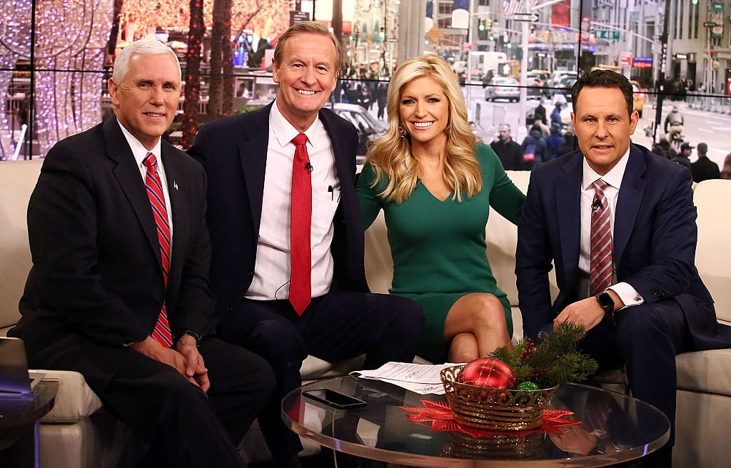 Mike Pence poses with Fox & Friends hosts, Steve Doocy, Ainsley Earhardt and Brian Kilmeade