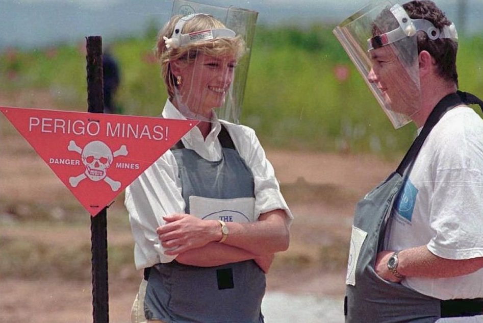 Princess Diana visiting the mine fields in Angola.