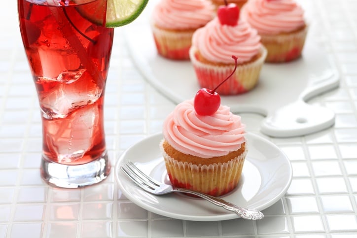 a Shirley Temple and cupcakes