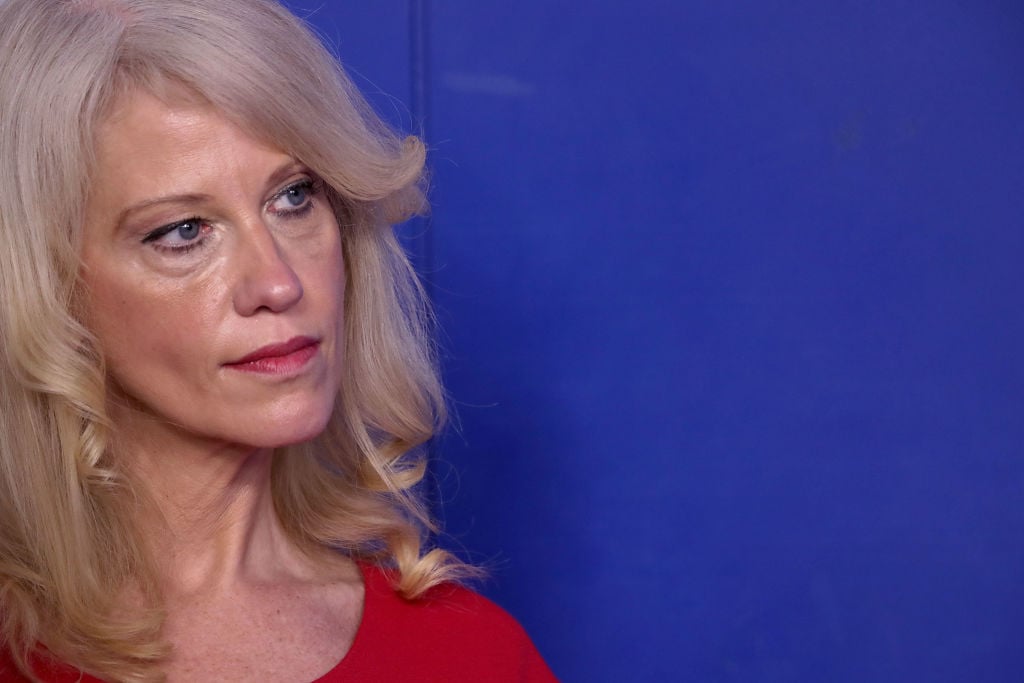 kellyann conway in red against a blue background kellyann conway in red against a blue background