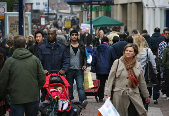 a diverse group of people on the street a diverse group of people on the street