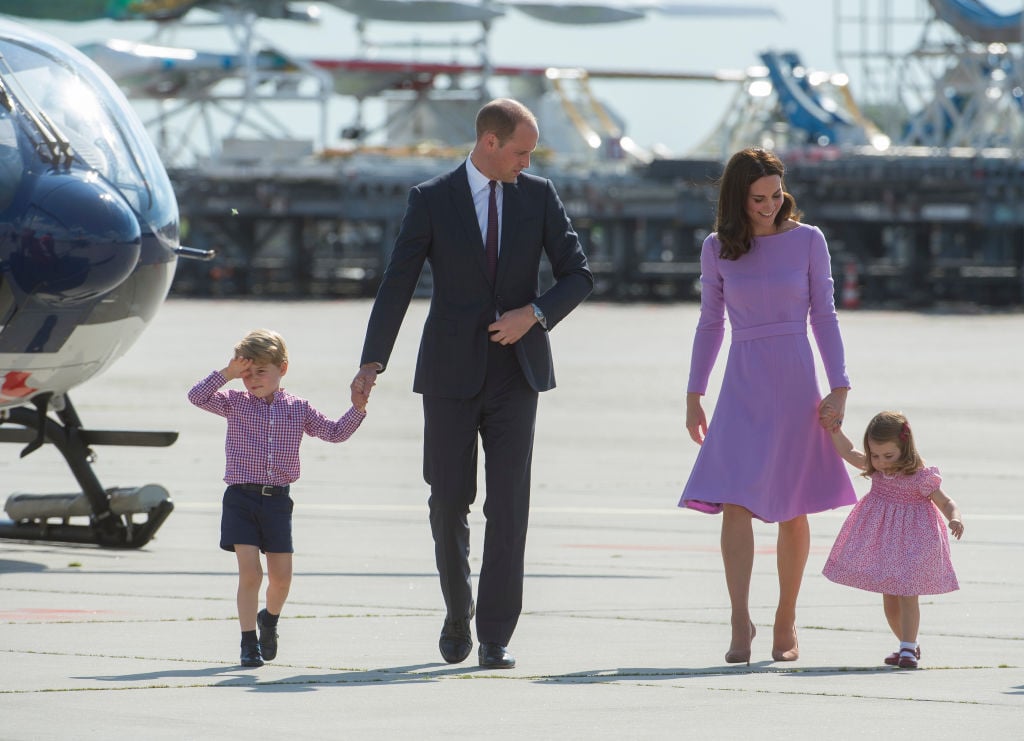 Prince William, Kate Middleton, and their kids at an airport
