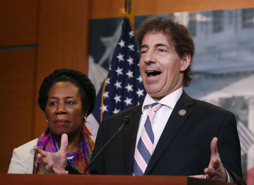 Jamie Raskin speaks while flanked by ranking member U.S. Rep. Sheila Jackson Lee during a news conference on Capitol Hill