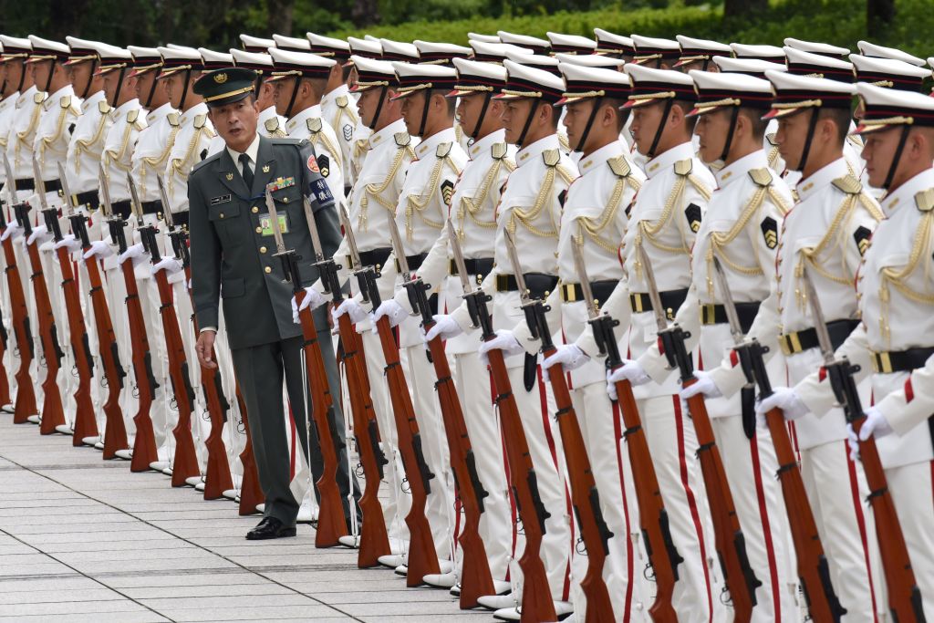 Japan Self-Defence Force honour guards make a line prior to a welcoming ceremony for Japan's Prime Minister Shinzo Abe.